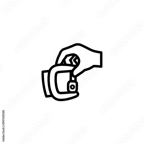 Hand Holding a Carabiner Outline Icon vector illustration