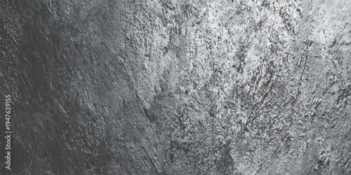 Abstract dark grey concrete texture background with distressed cement surface and moody vignette around the edges, highlighting the gritty details, and industrial speckles.