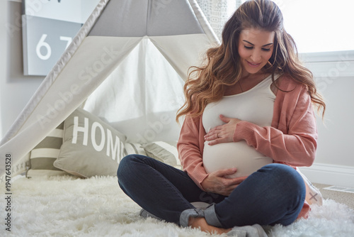 Valokuva Happy, relax and pregnant woman in home by tent with maternal bonding, love and connection