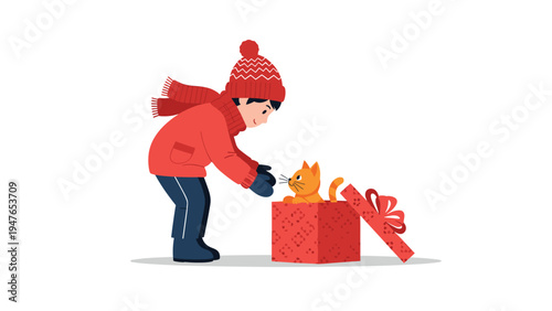 Adorable young child in winter clothes happily discovers a cute orange kitten sitting inside a red gift box on a white background.