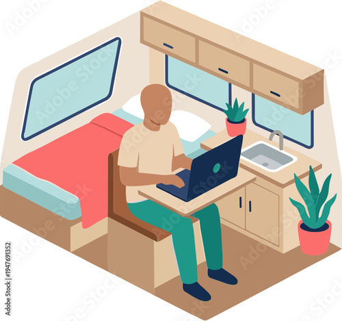 Man works on laptop inside modern camper van with kitchenette and bed