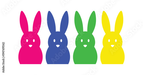 Four colorful plastic bunny rabbits in a row