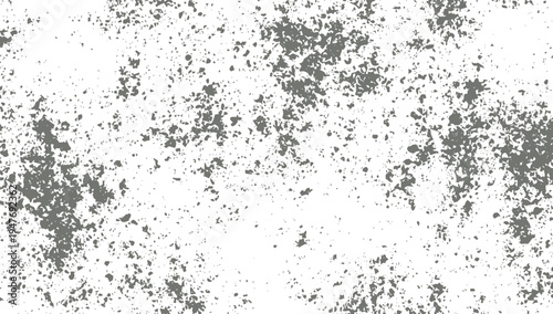 Grey speckled dust particles scattered on a white background texture