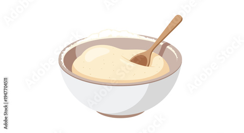 Bowl of creamy batter with a wooden spoon ready for baking