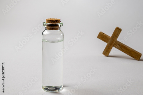 Glass Bottle With Holy Water And Cross