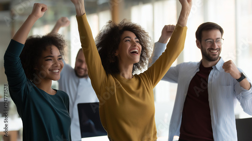 Coworkers celebrating success in an office party sharing stories and smiling during a joyful team meeting