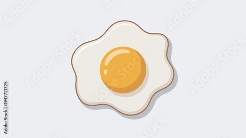 A fried egg with a runny yolk on a plain background