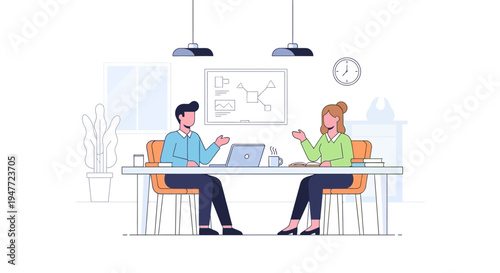 Two people collaborating at a modern office desk.