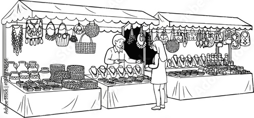 People browsing merchandise at outdoor stalls with handmade crafts and jewelry