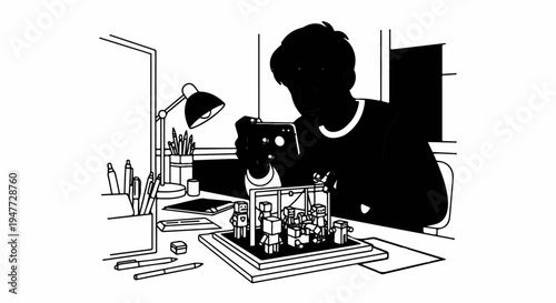 Person photographing small robot figures on a desk with drawing supplies