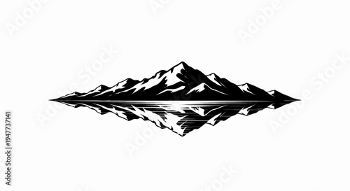 Stark, graphic mountain peaks mirrored in calm water