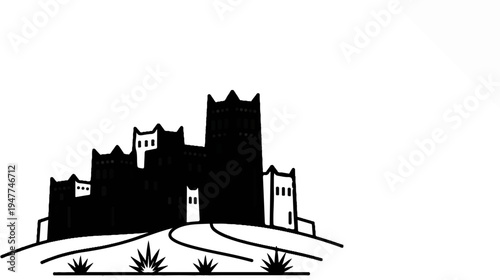 Silhouette of an ancient castle atop a hill with sparse vegetation