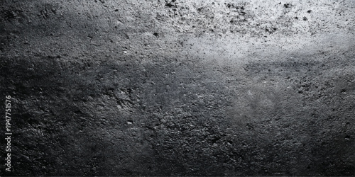 A dark and textured grunge wall surface featuring old grey concrete and stone patterns viewed through a rainy window with macro details of dirty cement and rough granite material