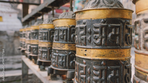 Row of Traditional Buddhist Prayer Wheels