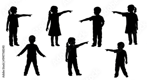 Silhouettes of children pointing.