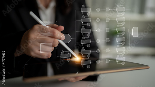 Professional businesswoman using digital tablet to create flowchart with stylus pen in modern office setting, showcasing innovative technology and productivity concepts Quark.