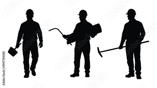 Silhouettes of three construction workers with tools