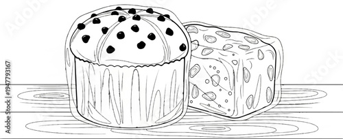 Two different baked goods with dark toppings on a wooden surface