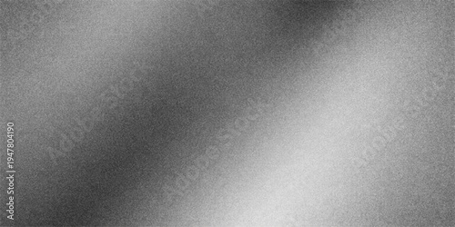 A dark brushed metal texture background featuring a seamless metallic steel pattern with a silver gray textured surface design for a professional material backdrop wallpaper