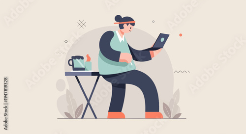 Person working on a laptop with a drink on a side table