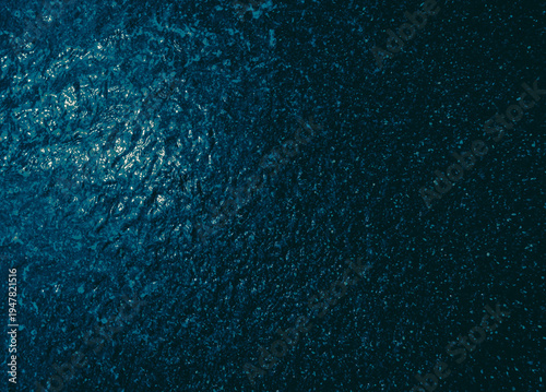 dark blue wet pebbles