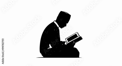 Silhouette of a person in prayer attire reading a book