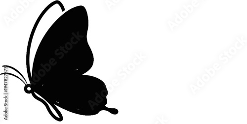 Stylized black butterfly silhouette in flight against white