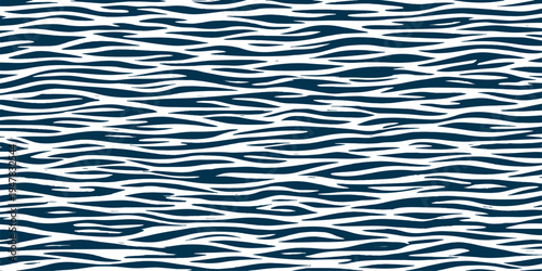 Abstract pattern of water ripples with dynamic waves forming a textured display of fluid motion, representing calm and serenity.