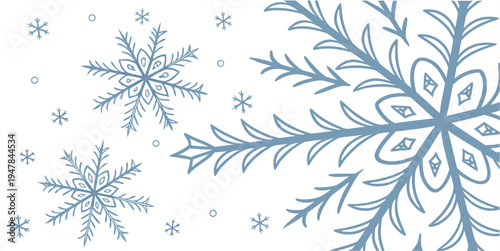 A large snowflake with intricate patterns and smaller snowflakes around it Vector