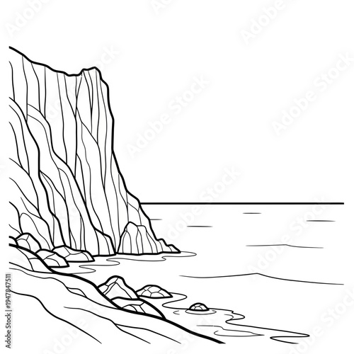 A cliff by the sea with rocks on the shoreline
