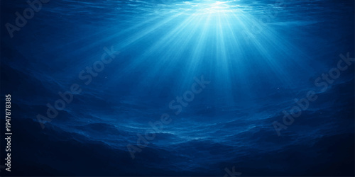 Abstract the serene beauty of the deep blue sea, where light streams from above, casting ethereal rays through the tranquil waters, creating a sense of peace and mystery.