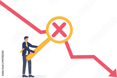 Businessman using a magnifying glass to inspect a downward market trend arrow representing loss