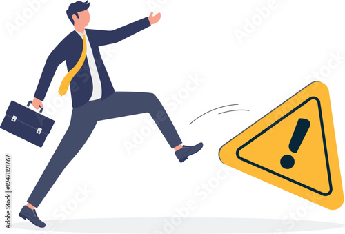 Businessman kicking a yellow warning sign representing risk-taking behavior and overcoming business obstacles