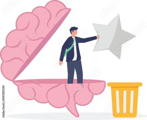 Businessman removing a gray star from a brain to replace it with high quality standards