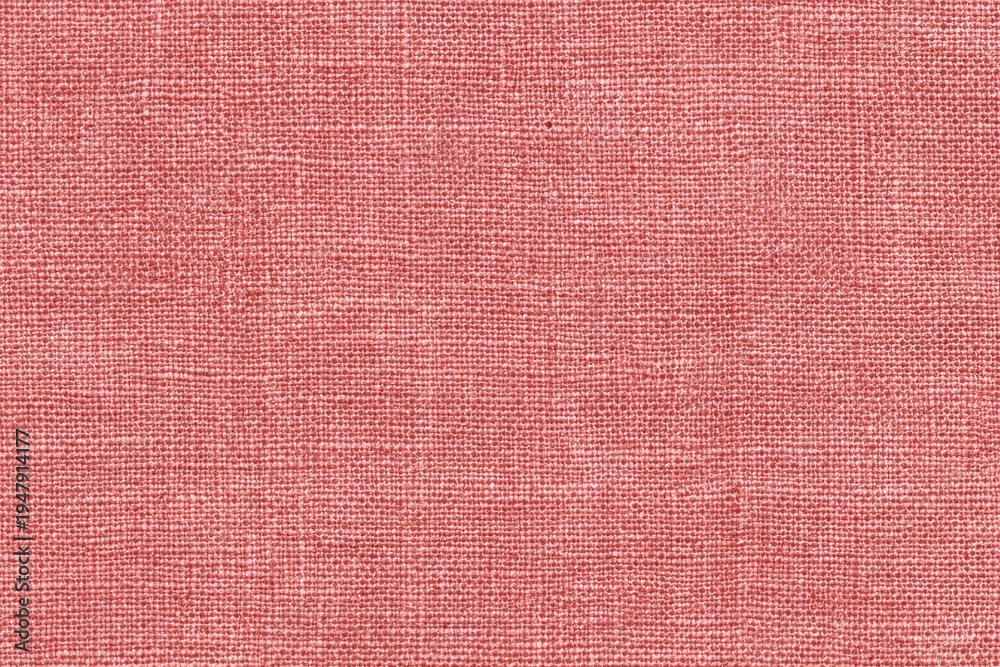 Fototapeta premium texture of a light red canvas fabric with soft, natural hues and subtle grain patterns. illustration for fashion or home decor materials