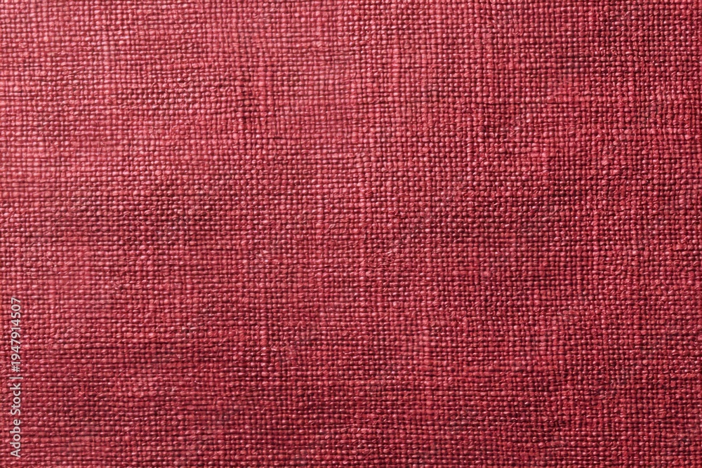 Fototapeta premium texture of a red canvas fabric with soft, natural hues and subtle grain patterns. illustration for fashion or home decor materials