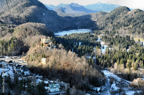 Beautiful natural landscape blue water and sky dense forest Castle Hohenscwangau Bavarian Alps Germany