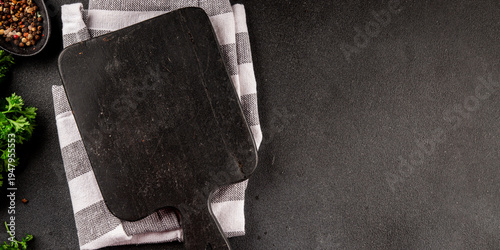 Wooden cutting board for food empty background spices and herbs fresh gourmet food background on the table rustic food top view copy space