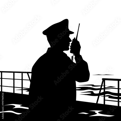 Man in hat talking on radio.