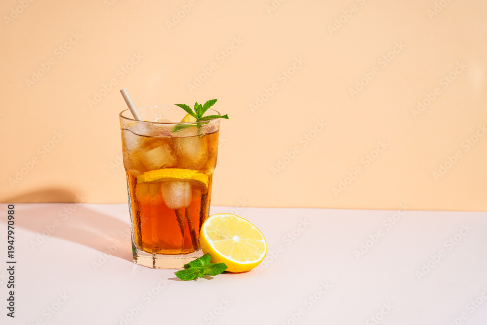 Fototapeta premium Summer cold drink on colored background with hard shadows.