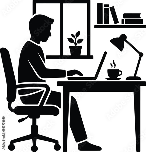 Man sitting at desk working on laptop computer at home office  interior