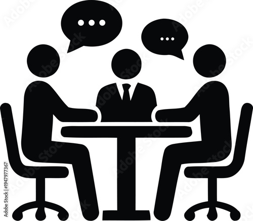 Three people sitting at a table talking to each other in business meeting