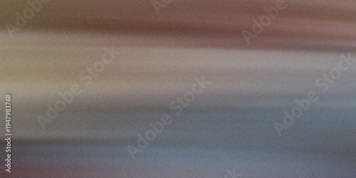 A blurry image with a mix of brown and blue colors