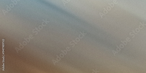 Foto A Blurry Image with Shades of Brown, Gray, and Blue