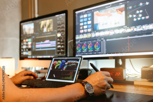 Tableau sur toile Colorist are color grading a new film or video in his professional studio