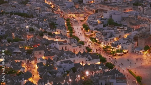 Aerial night view of the illuminated Trulli in Alberobello, Puglia, Italy