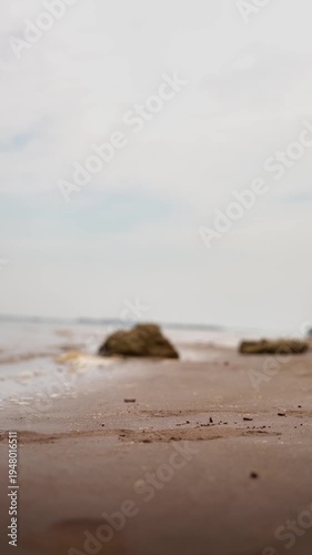 Peaceful Tropical Beach Landscape with Gentle Ocean Waves
