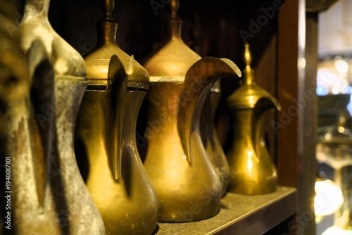 golden ancient Arabic pots in a raw