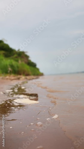 Minimal Sandy Beach Texture with Ocean Shoreline
