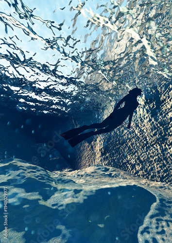 Silhouette of a woman underwater, immersed in crystal clear and transparent waters